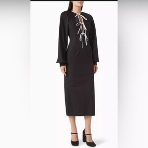 ROWEN ROSE
Strapless Peplum Dress in Denim size S